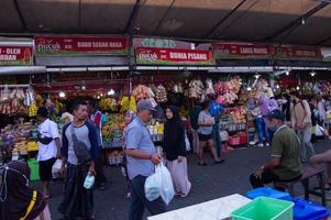 pasuruan, indonesia, 2022 - view of the atmosphere of the center of souvenirs at the Cheng Ho Mosque market which is crowded with visitors photo