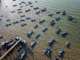 Fishing boats in row photo