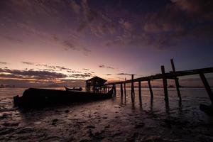 Dramatic sky at fisherman dove jetty at Jelutong photo