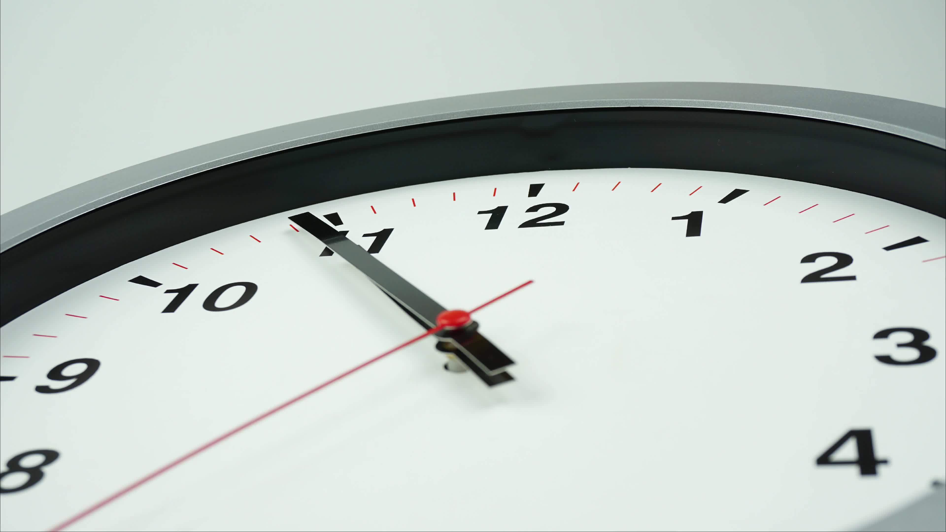 Closeup of the clock hanging on the wall of the house. 21648960 Stock