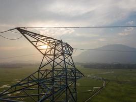 Aerial view sunrise over electric tower photo