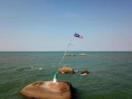 Aerial view Malaysia flag at sea photo