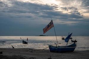 Malaysia flag on boat photo