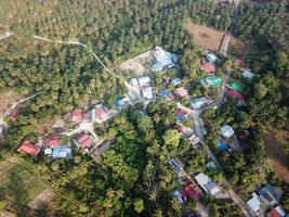 Malays village near rural farm oil palm photo