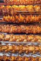 Rotisserie chicken on a rack photo