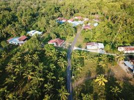 Aerial view Malays village in green bush photo