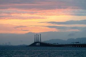 Burning sky over Penang Bridge photo