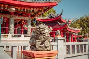 Traditional Chinese guardian gate statute on the Chinese temples when Chinese new years.  The photo is suitable to use for chinese new year, lunar new year background and content media.