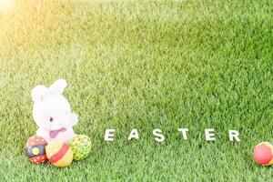 Bunny toys and Easter eggs with text photo