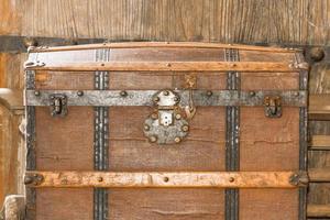 Close up old metal casket photo