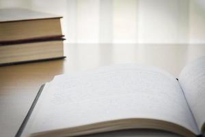 Notebook on wood table photo