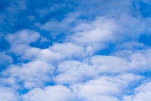 Blue sky with white clouds photo