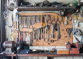 Tool shelf against a wall photo