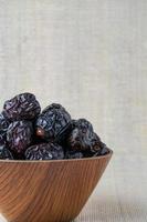 Delicious ajwa dates kurma nabi, Much sought after during the month of Ramadan as a dish for breaking the fast, ramadhan kareem, empty space, copy space. photo