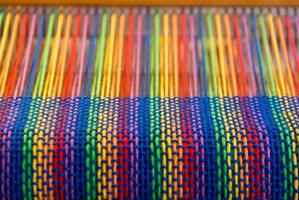 Comb loom with rainbow colors and diversity flag photo