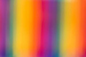 Multicolored defocused textured background with rainbow colors photo