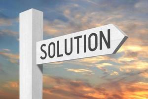 Solution - White Wooden Signpost with one Arrow and Sunset Sky in Background photo