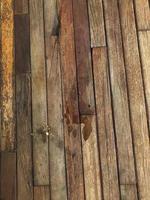 Human right footprints still wet on the wooden floor photo