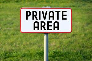 Private Area - White Sign on a Grass photo