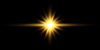 Golden star, on a black background, the effect of glow and rays of light, glowing lights, sun.vector. vector