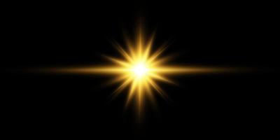 Golden star, on a black background, the effect of glow and rays of light, glowing lights, sun.vector. vector