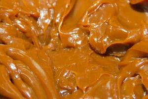 textured background of Argentinean dulce de leche photo