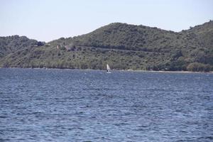 water sport in mountain reservoir in summer photo