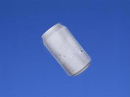 Aluminum cans shot in the air with blue sky background. 3d render photo