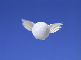 flying volleyball ball shot in the air with blue sky background photo