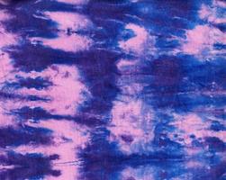 Tie Dye. Fabric Hippie Design. Batik.Textile shiboriTie Dye. Fabric Hippie Design. Indigo Print. Cotton fabric abstract texture psychedelic background. photo