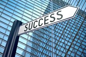 Success - Signpost With One Arrow, Modern Office Building in Background photo