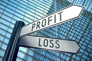 Profit and Loss - Signpost With Two Arrows, Office Building in Background photo