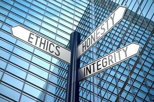 Ethics Concept - Signpost With Three Arrows, Office Building in Background photo
