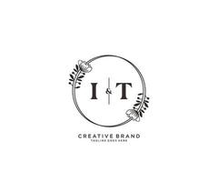 initial IT letters hand drawn feminine and floral botanical logo suitable for spa salon skin hair beauty boutique and cosmetic company. vector