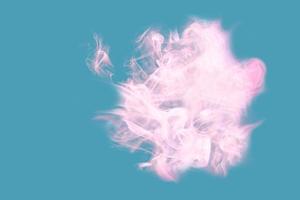 Pink gentle smoke on a blue background. photo