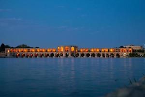 Isfahan, Iran, 2022 - Old Khajoo bridge, across the Zayandeh River in Isfahan, Iran. photo