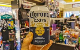 Puerto Escondido Oaxaca Mexico 2023 Buying Corona beer in the Oxxo store shop in Mexico. photo