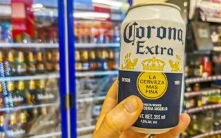 Puerto Escondido Oaxaca Mexico 2023 Buying Corona beer in the Oxxo store shop in Mexico. photo