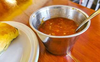 Spicy red Mexican chili sauce in Puerto Escondido Mexico. photo