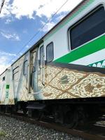 Surakarta, Indonesia. 2022. adhi sumarmo airport train passes by photo