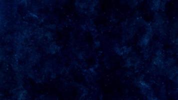 Artistic hand painted multi layered dark blue background. dark blue nebula sparkle light star universe in outer space horizontal galaxy on space. navy blue watercolor and paper texture. wash aqua photo