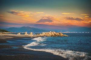 Mt. Fuji with beach at sunset in Miho no Matsubara, Shizuoka, Japan photo