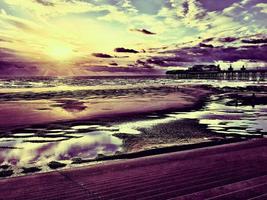 A view of Blackpool Pleasure Beach at sunset photo