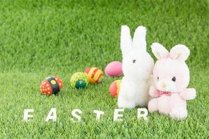 Bunny toys and Easter eggs with text photo