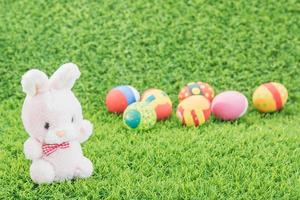 Easter bunny toy and Easter eggs photo