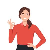 Happy beautiful young woman giving well done ok sign with winking eye and positive feedback approval standing with hand on the waist looking confident vector