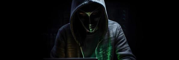 Unveiling the Enigmatic World of Cybercrime. A White Masked Hacker's Front View Amidst Dark Hood and Green Matrix Code Background photo