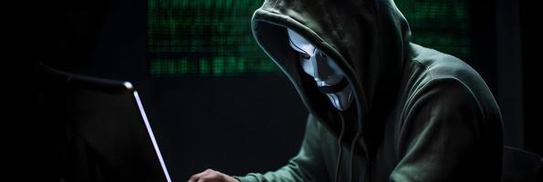 Unveiling the Enigmatic World of Cybercrime. A White Masked Hacker's Front View Amidst Dark Hood and Green Matrix Code Background photo