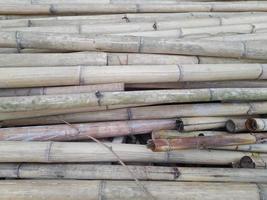 Pile of bamboo pole. Art of bamboo abstract background. photo