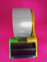duck tape isolated with pink background photo